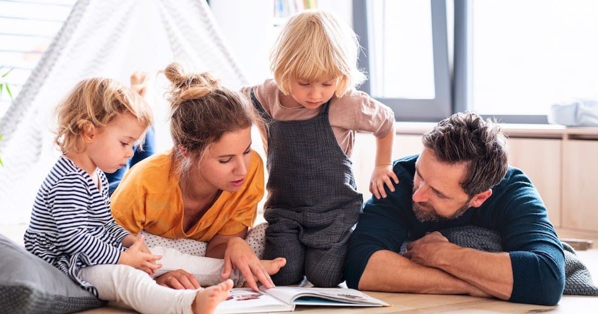 Family reading a book